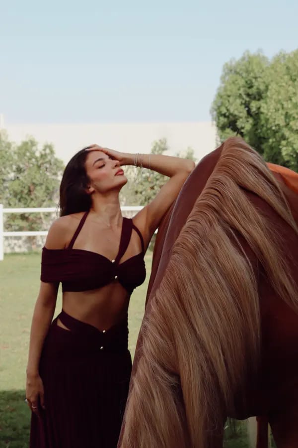 Vertical fashion shoot with horse Dubai